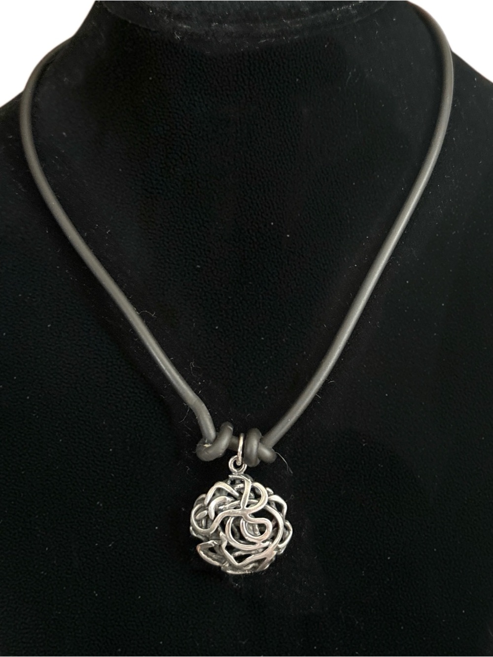 Sterling Silver Knot Pendant on Black Leather Cord Necklace. 18”